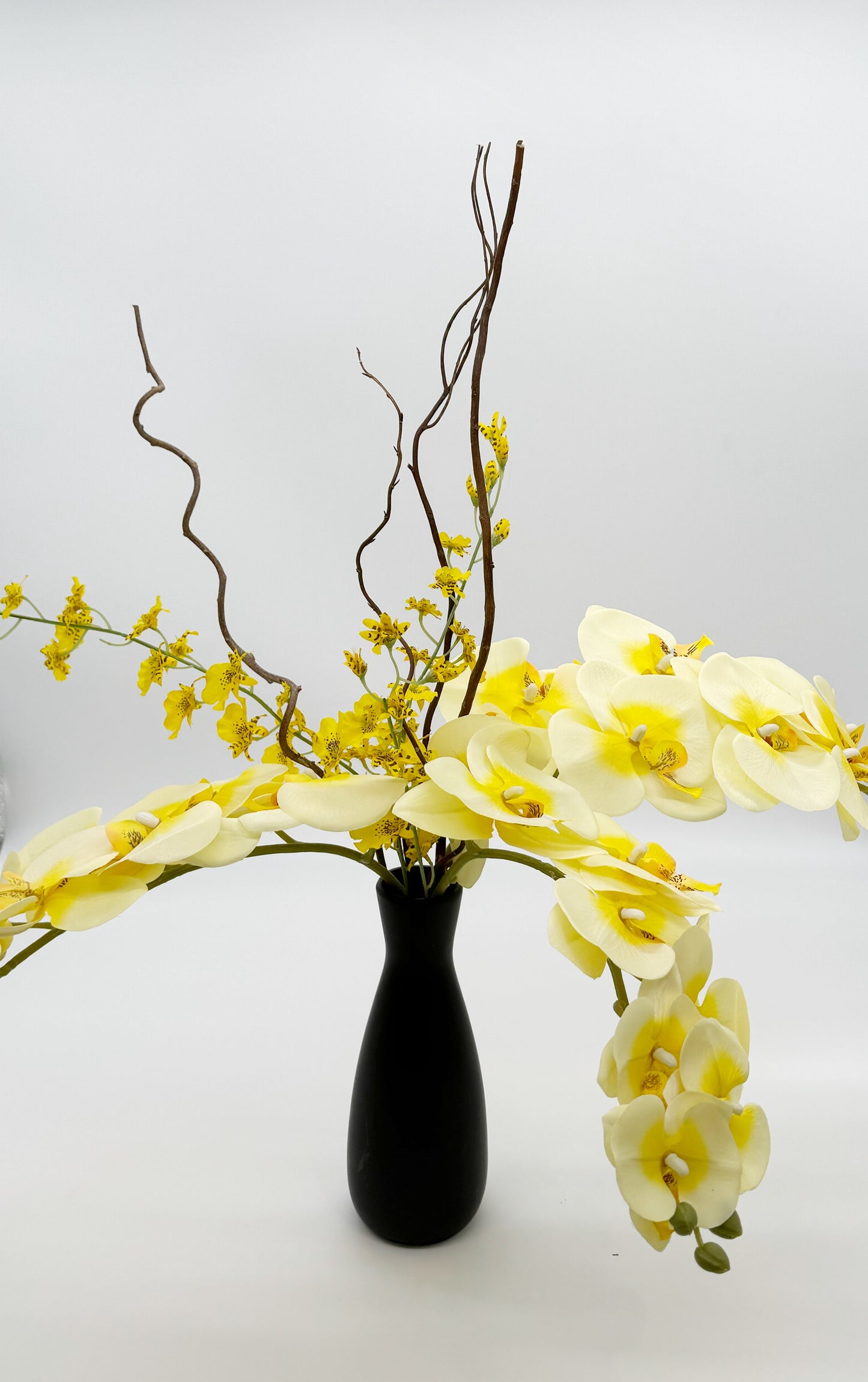 Sleek Yellow Orchids Arrangement
