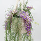 Natural Beauty: Silk Wisteria and Sea Grass Hanging Planter in Ceramic Pot with Macrame Hanger