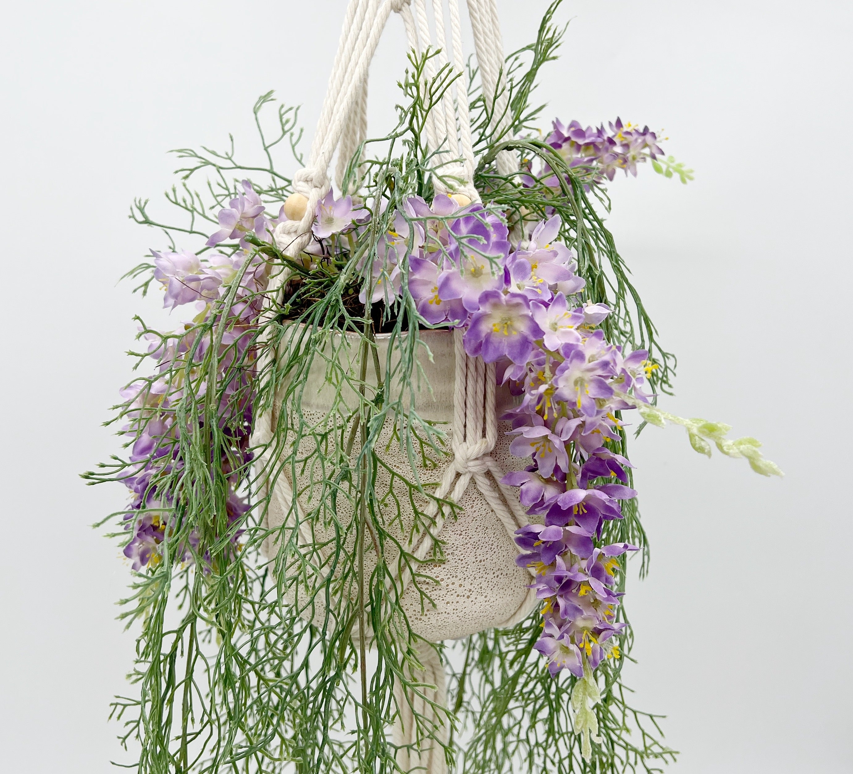 purple hanging flower plant Elegant Silk Wisteria Hanging Planter