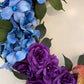 Corona del Orgullo de 18" con rosas, caléndulas, hortensias